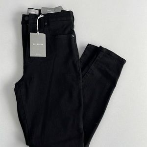 Everlane high rise black skinny denim jeans.